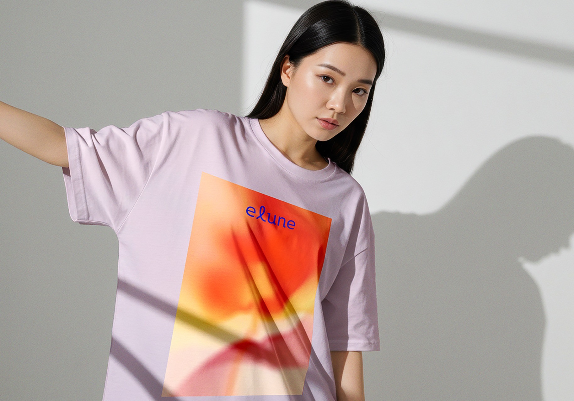 Print and illustration applied to a pastel T-shirt