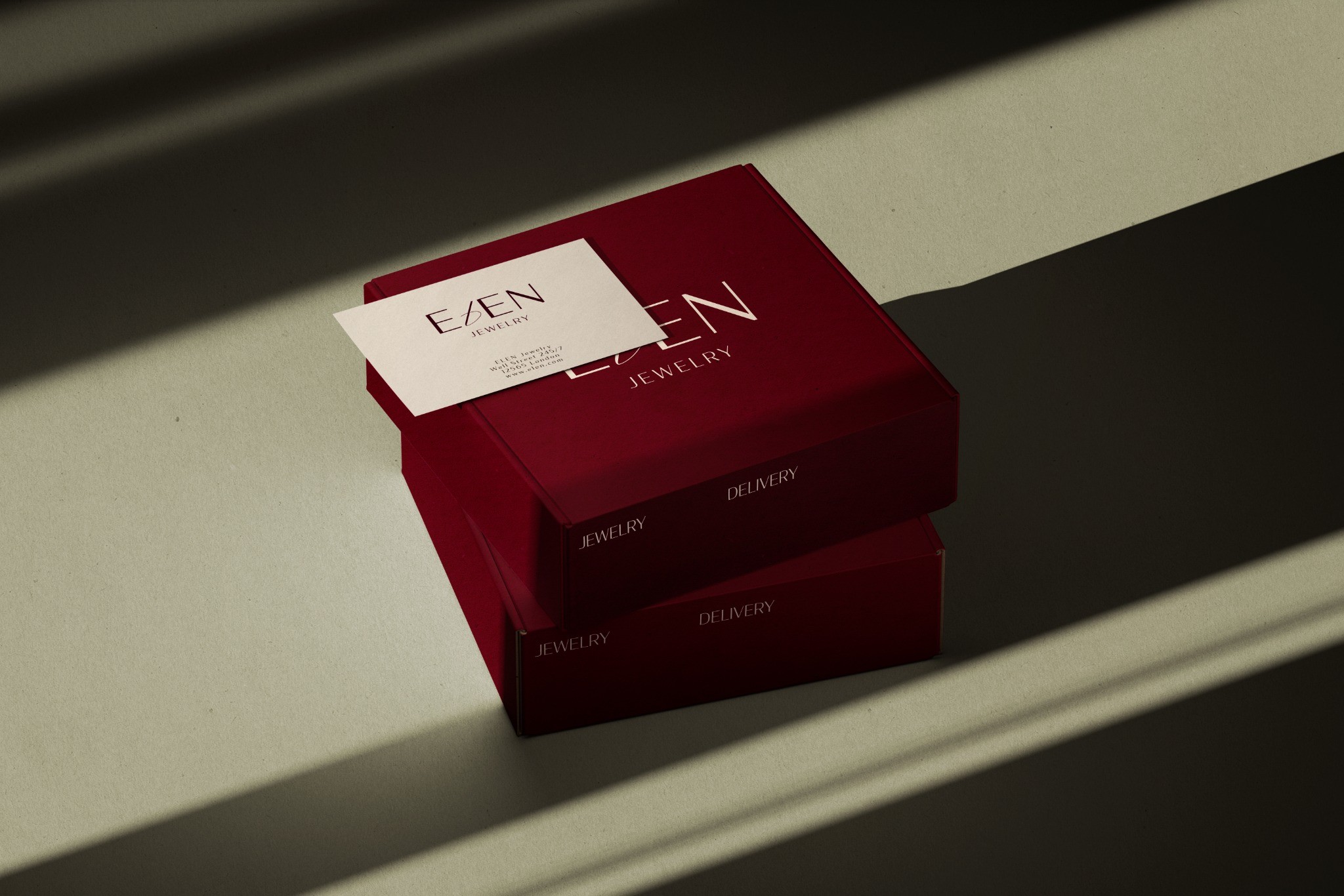 Red Eden Jewelry boxes with a business card