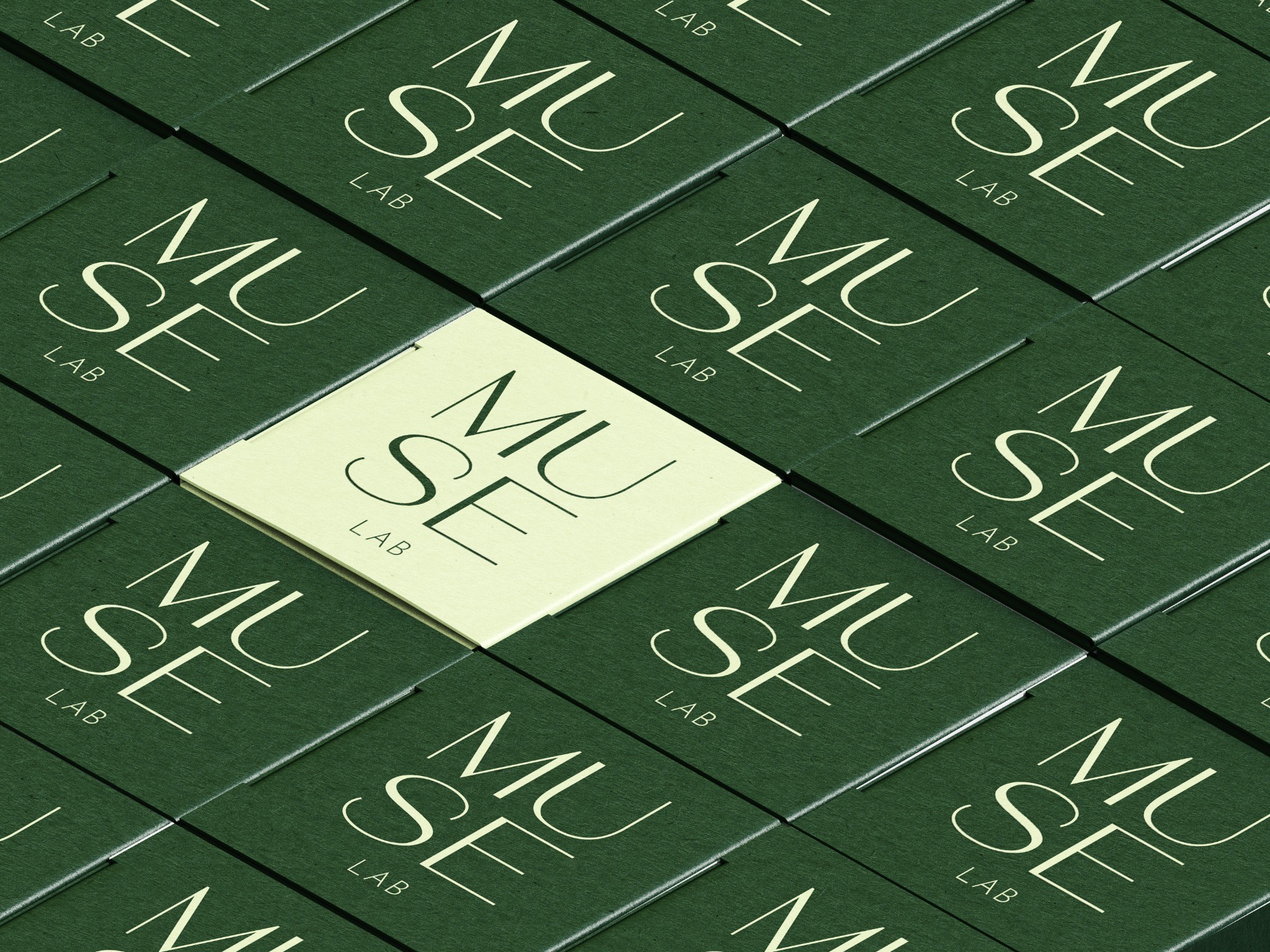 Green Muse Lab boxes in a repeating arrangement